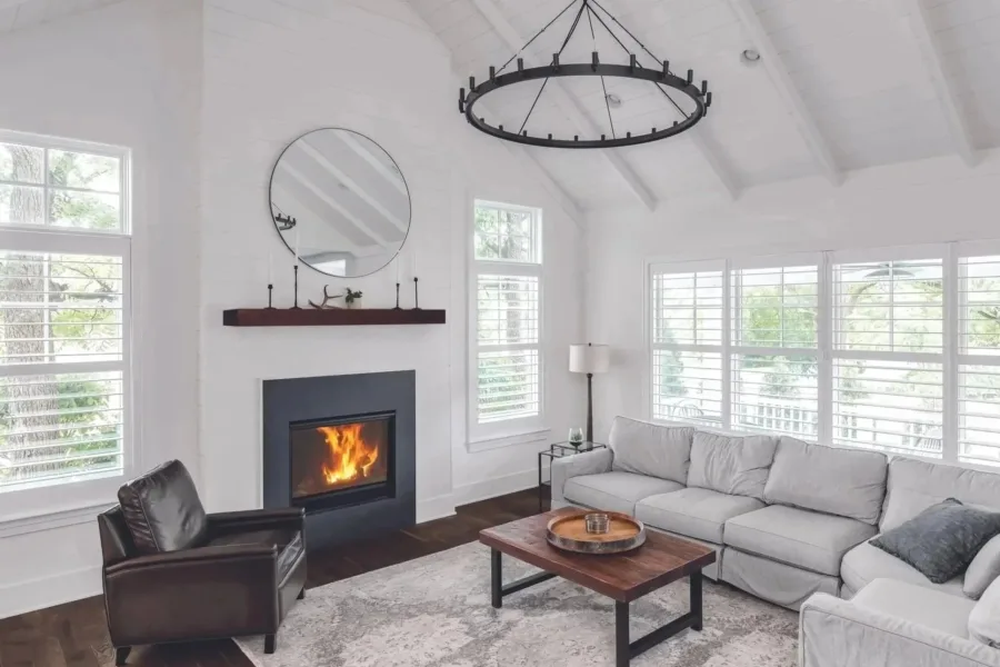 A Lexington Hearth Architect Series wood mantel in cherry over a fireplace (manufacturer photo)